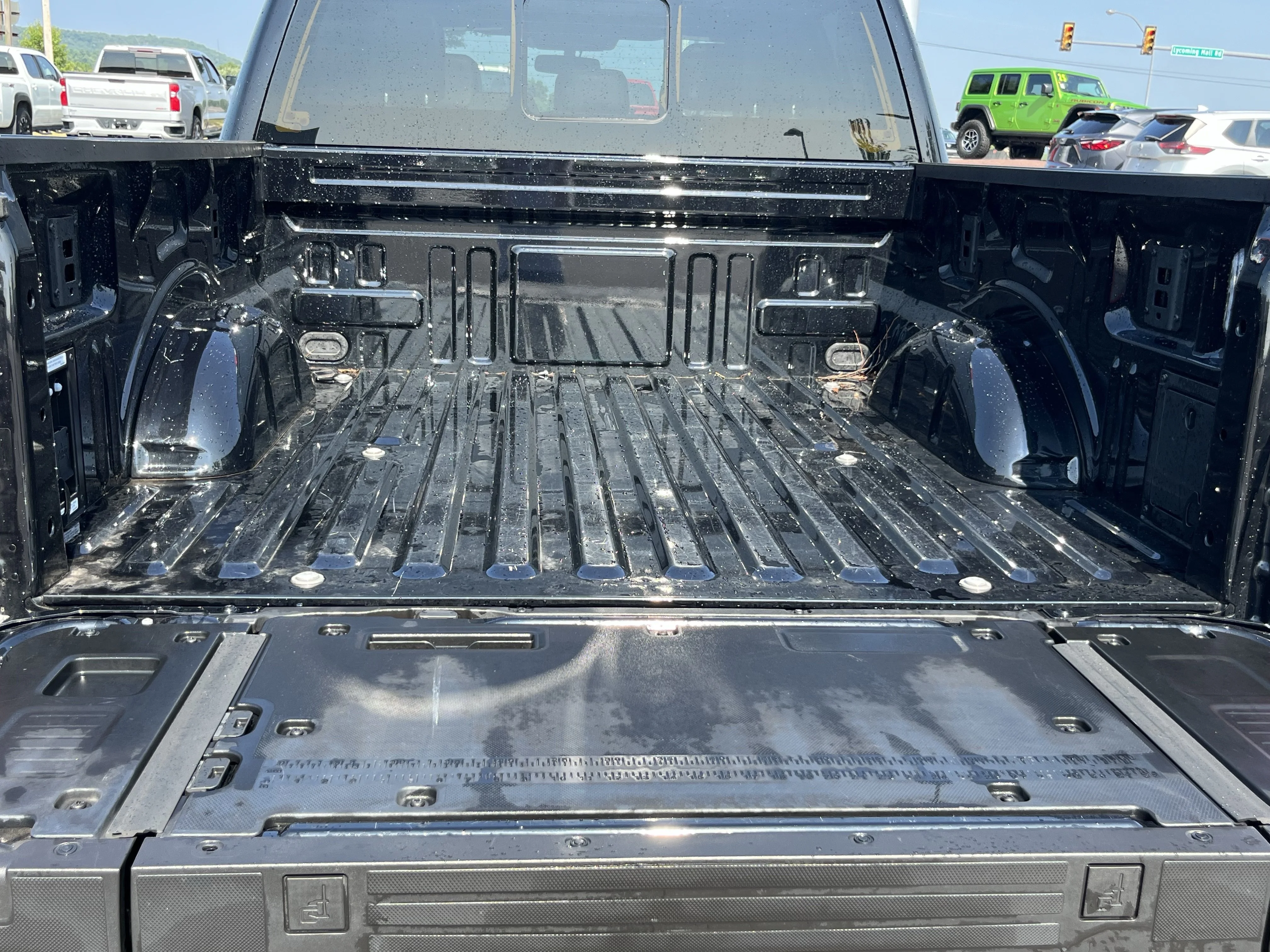 Used 2025 Black Metallic Ford Lariat image 7