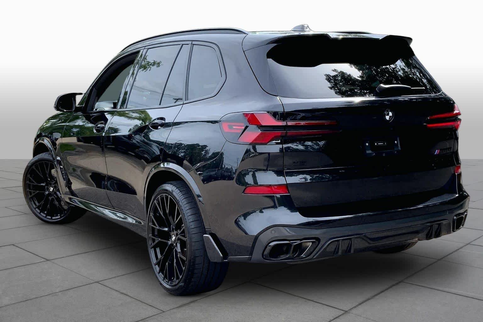 Used 2025 Black Sapphire Metallic BMW M60i image 12