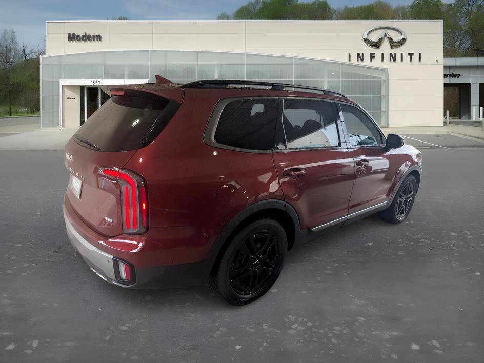 Used 2023 Dawning Red Kia SX X-Line image 3