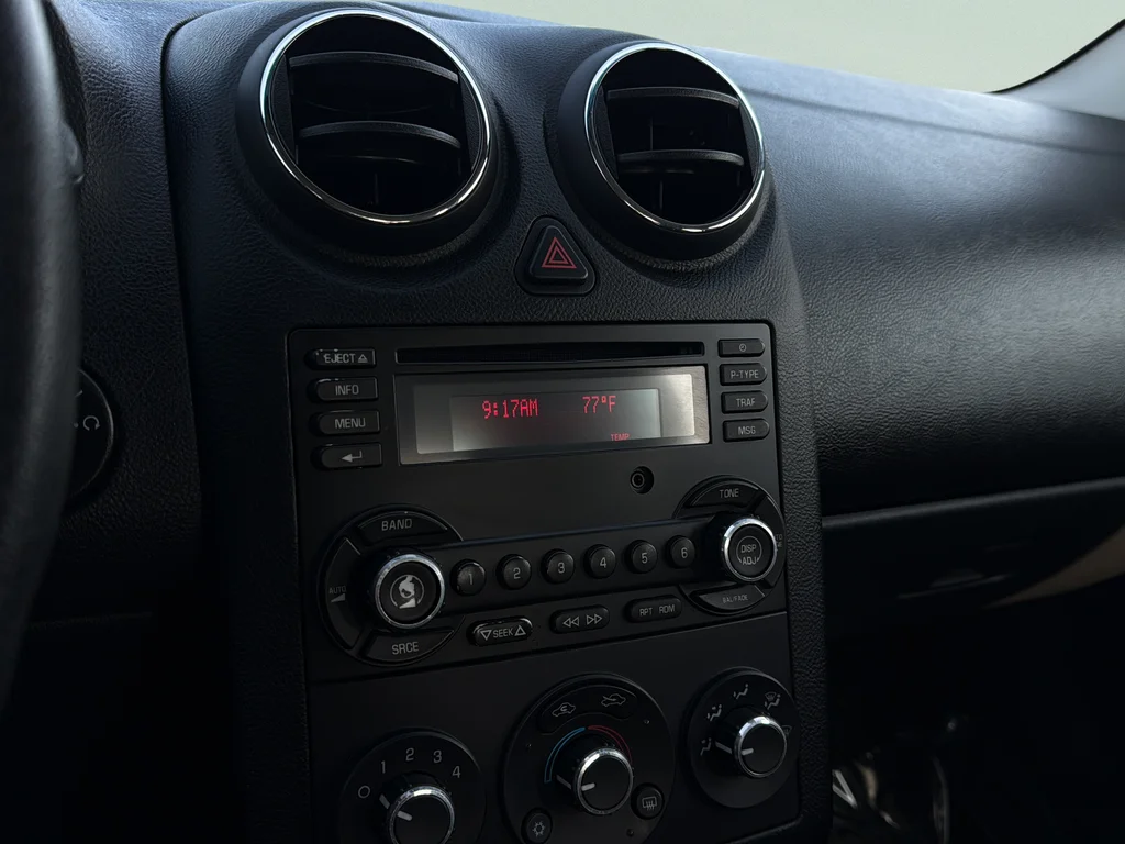Used 2009 Carbon Black Metallic Pontiac Base image 9