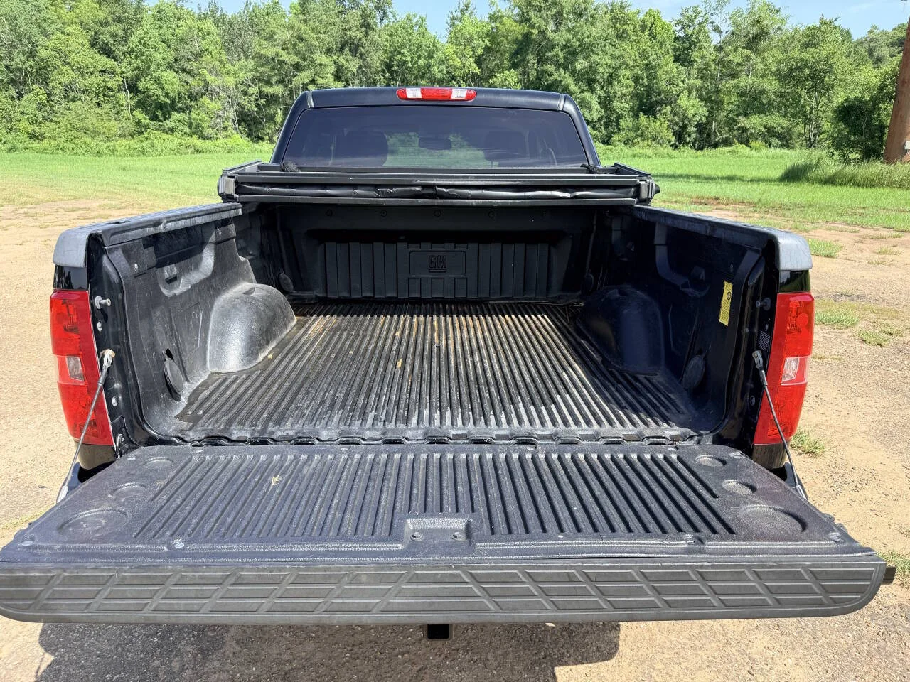 Used 2013 Black Chevrolet LTZ 4x4 4dr Crew Cab 5.8 ft. SB image 12