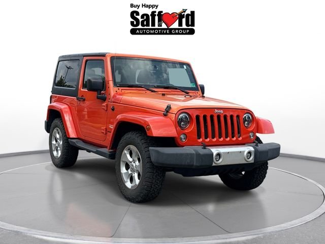 Used 2015 Orange Jeep Sahara image 9