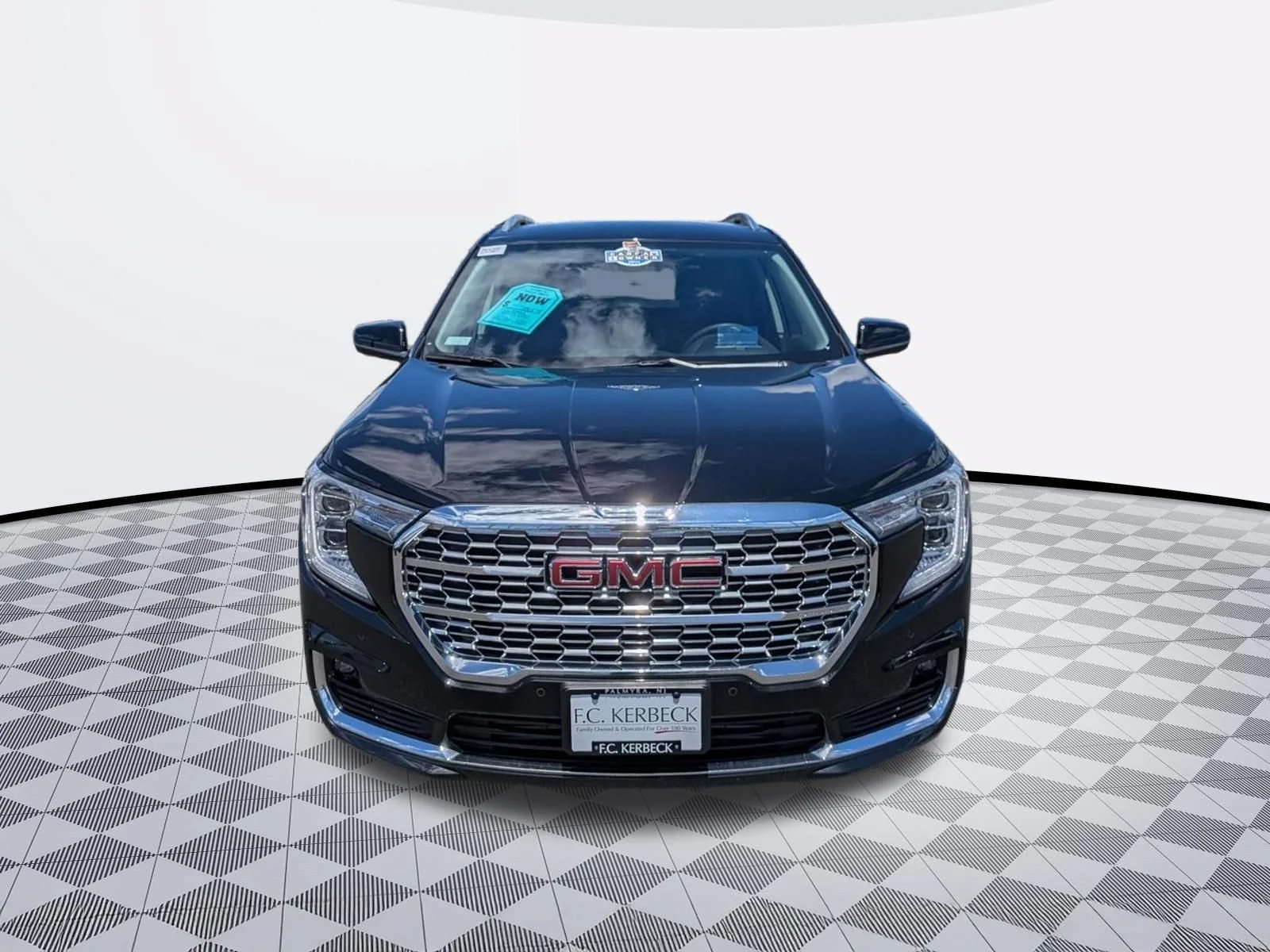 Used 2024 Ebony Twilight Metallic GMC Denali image 2