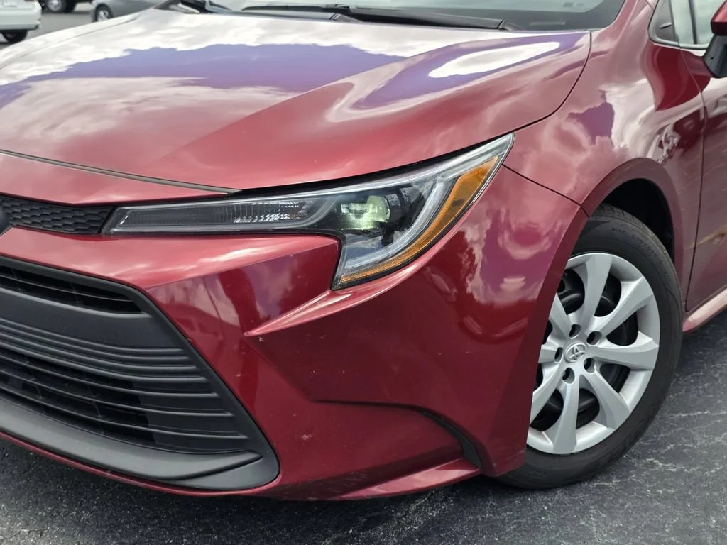 Used 2024 Red Med Toyota LE image 6