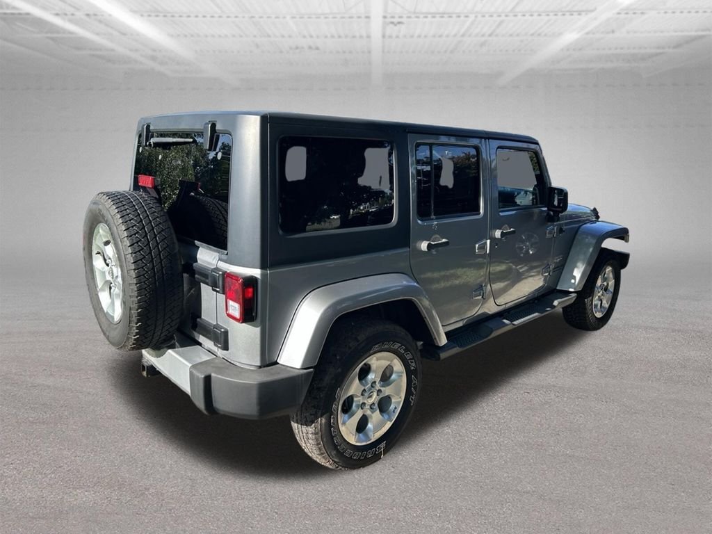 Used 2014 Gray Jeep Unlimited Sahara image 5