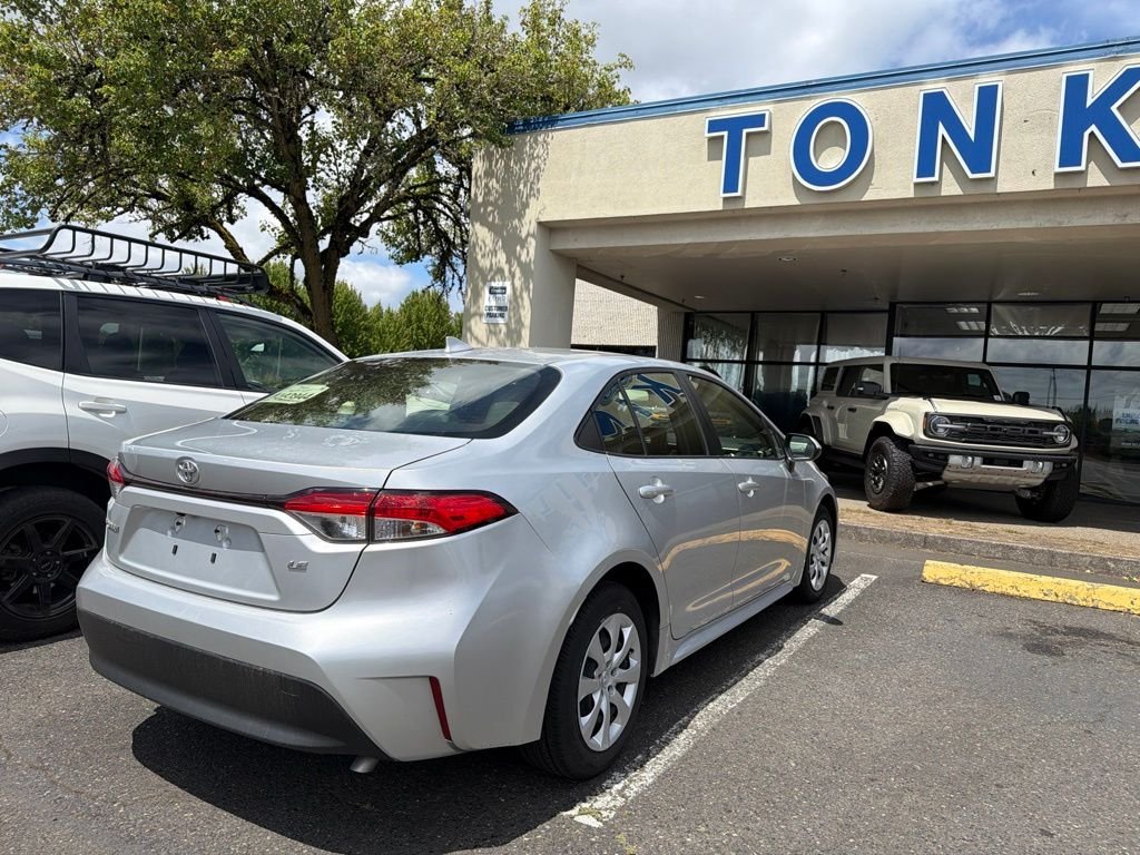 Used 2024 Classic Silver Metallic Toyota LE image 4