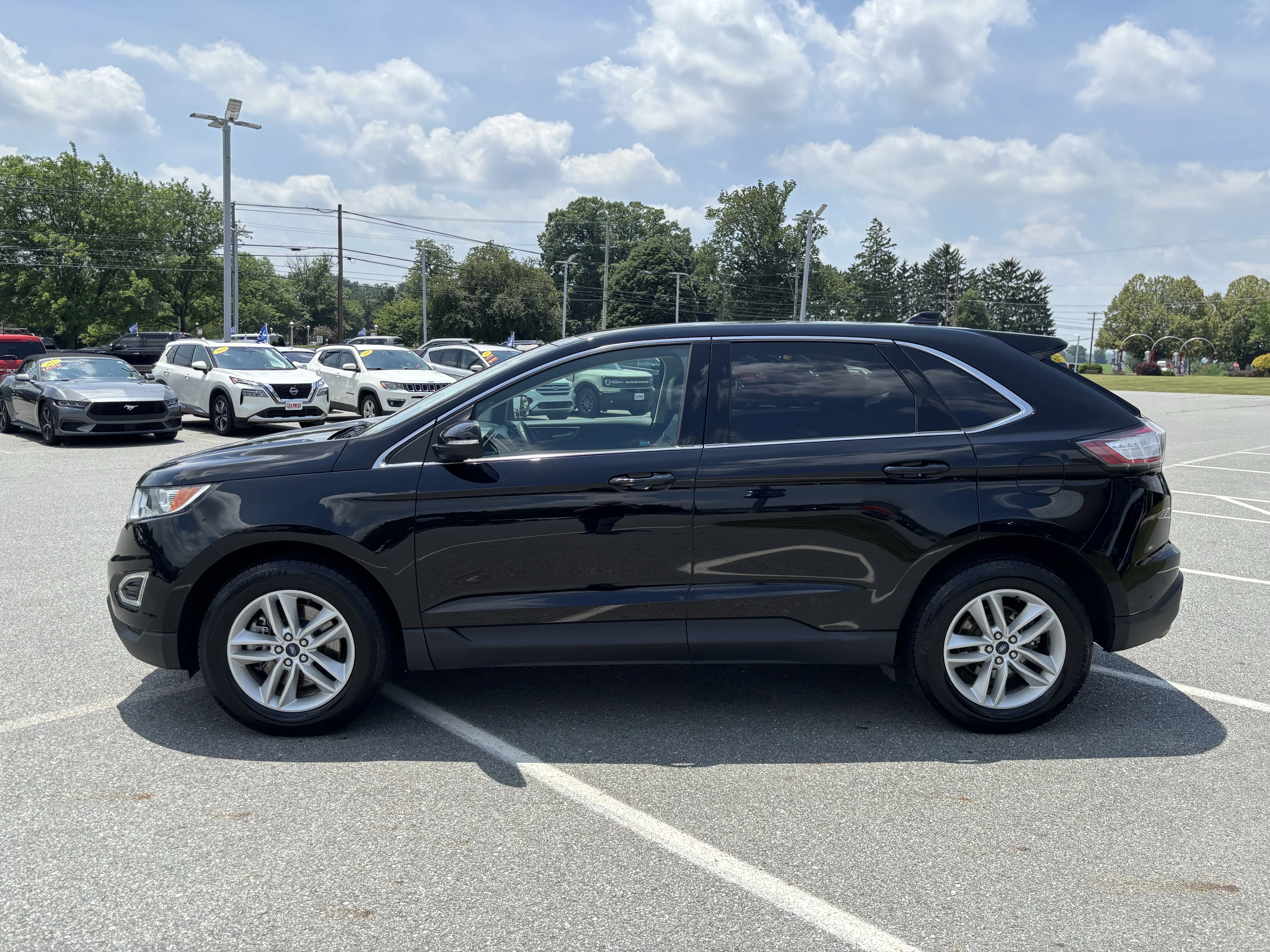 Used 2018 Shadow Black Ford SEL image 4