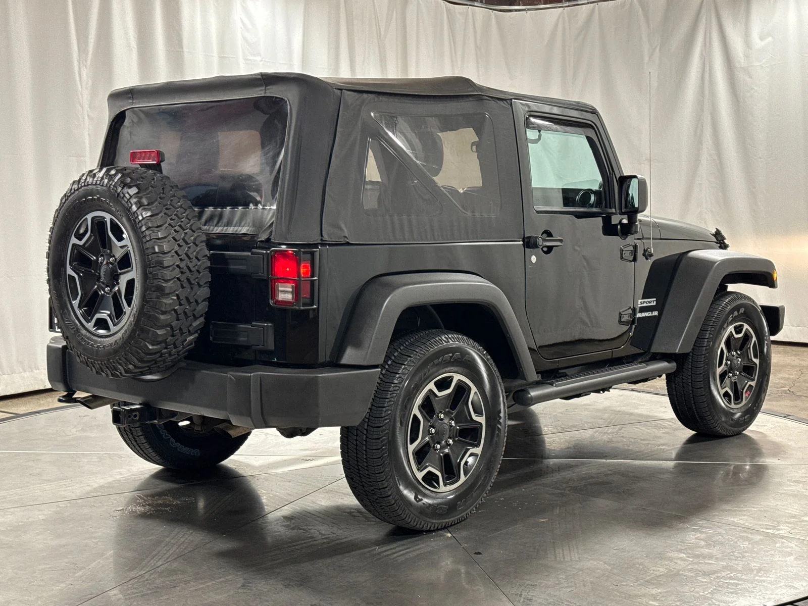 Used 2012 Black / Forest Green Jeep Sport image 10