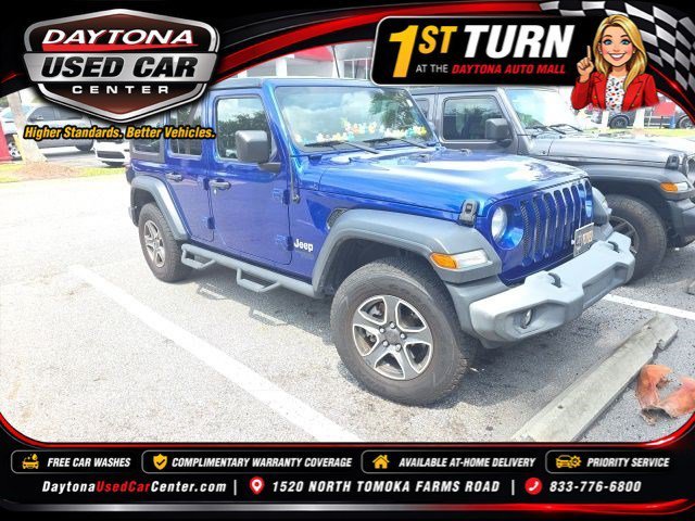 Used 2018 Ocean Blue Metallic Jeep Sport S image 1