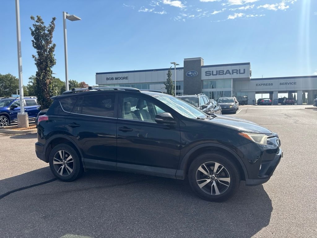 Used 2016 Black Toyota XLE image 1