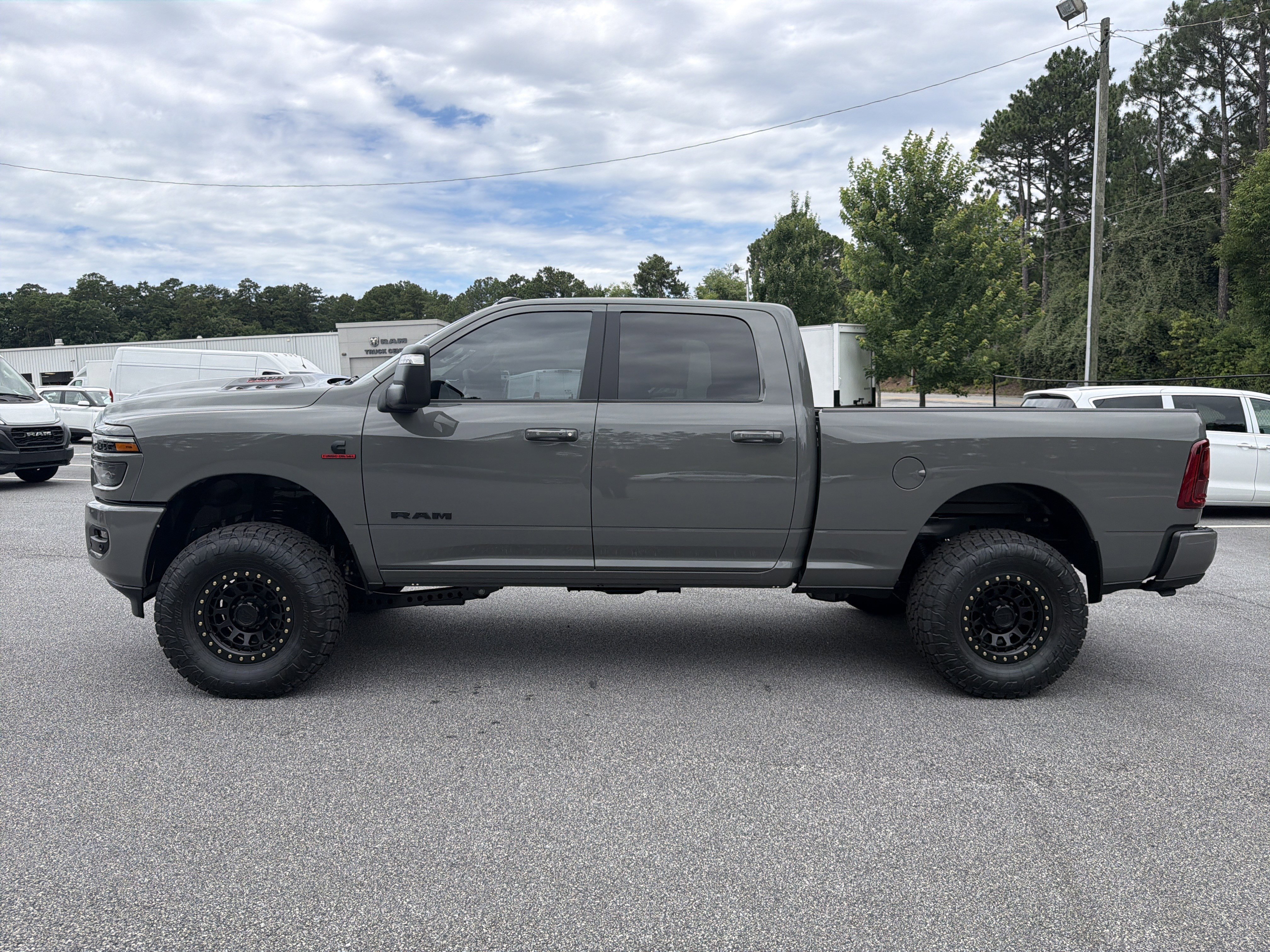 New 2026 Ceramic Gray Clear-Coat Exterior Paint RAM Laramie image 4