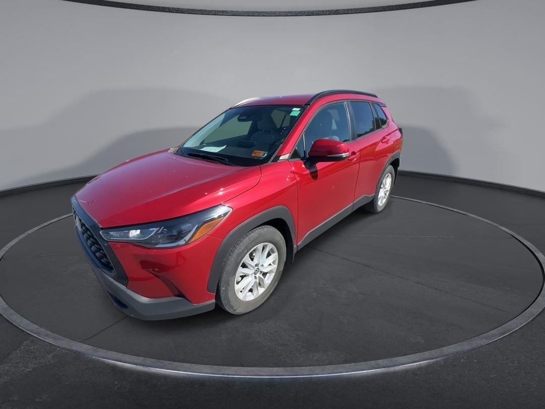 Used 2023 Barcelona Red Metallic Toyota LE image 4