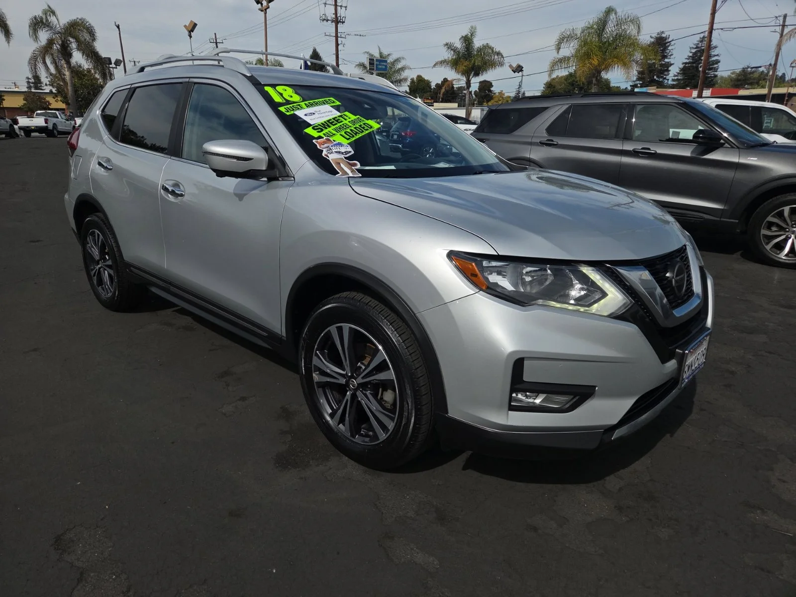 Certified Used 2018 Brilliant Silver Nissan SL image 1