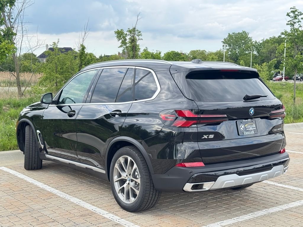 Used 2026 Black Sapphire Metallic BMW xDrive50e image 4