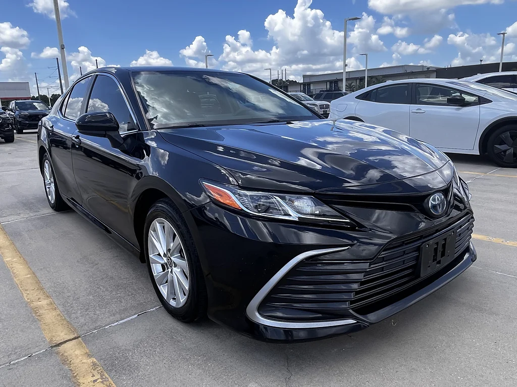 Used 2022 Midnight Black Metallic Toyota LE image 1
