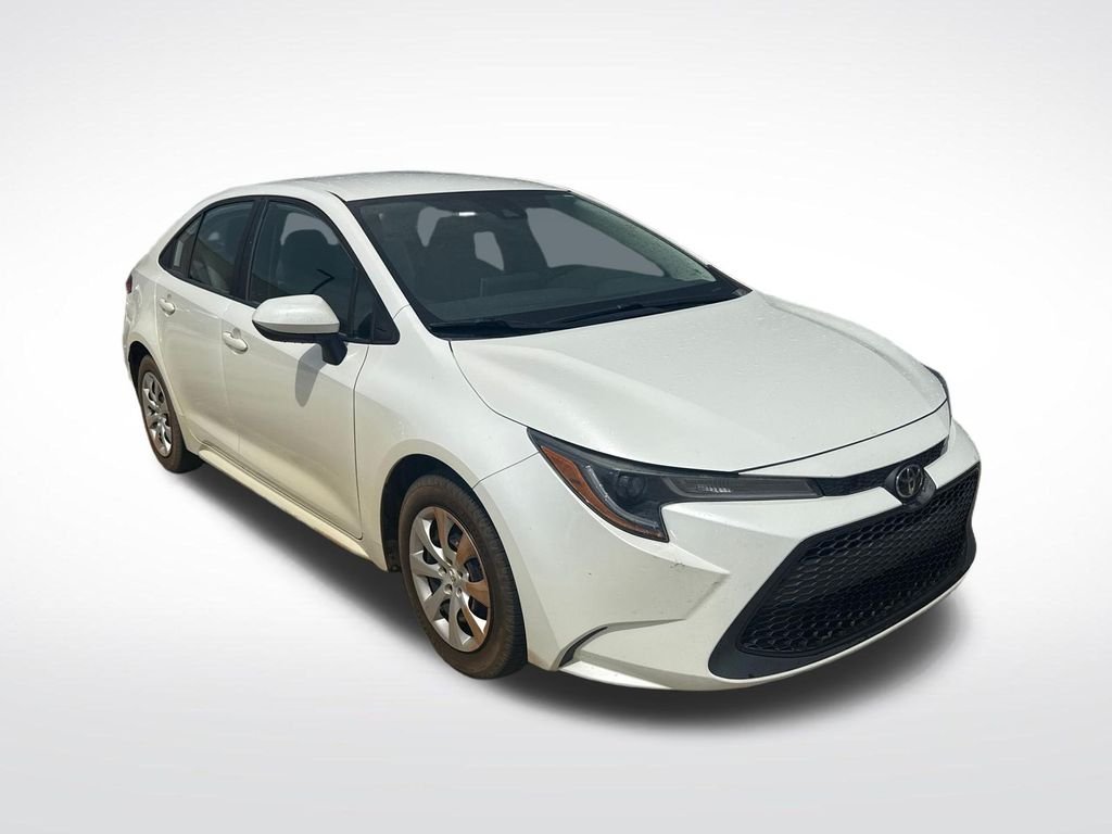 Used 2021 White Toyota LE image 1