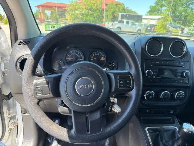 Used 2014 White Jeep Sport image 9