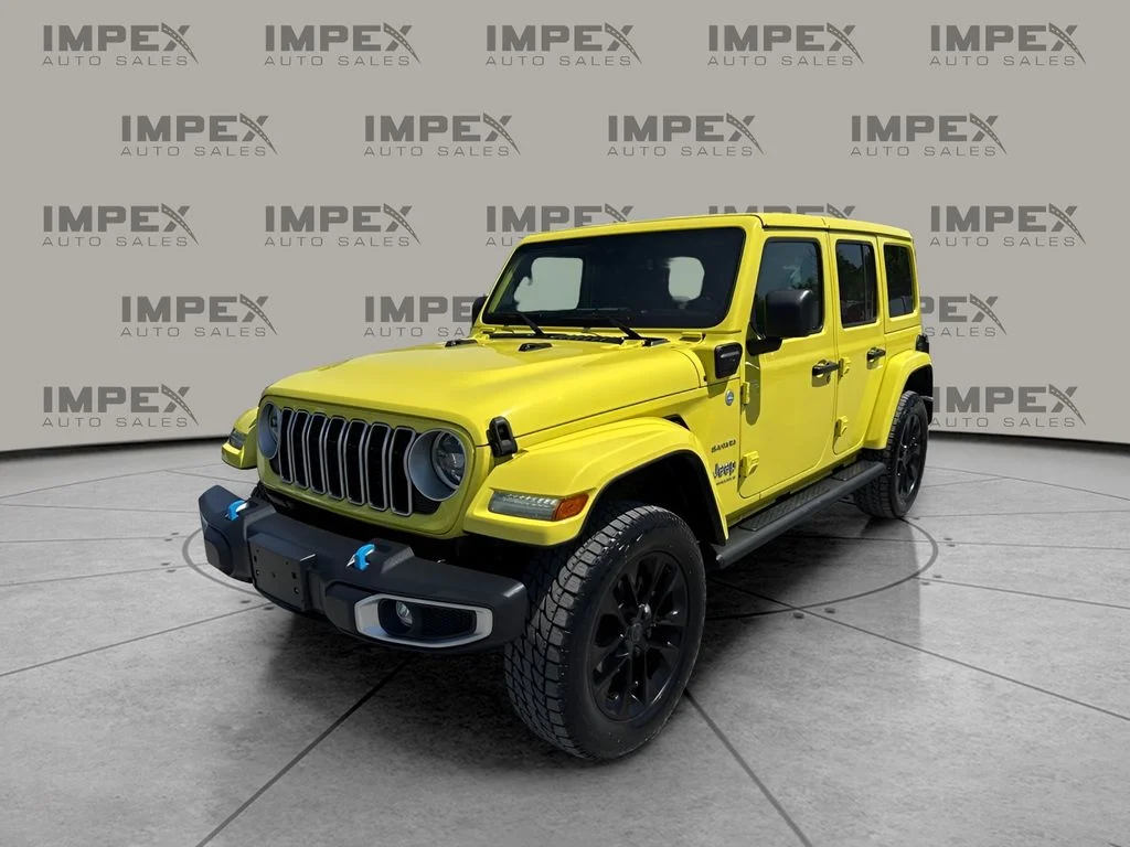 Used 2024 Yellow Jeep Sahara 4xe image 1