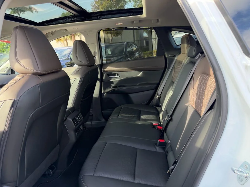 Certified Used 2025 White Nissan Platinum image 12