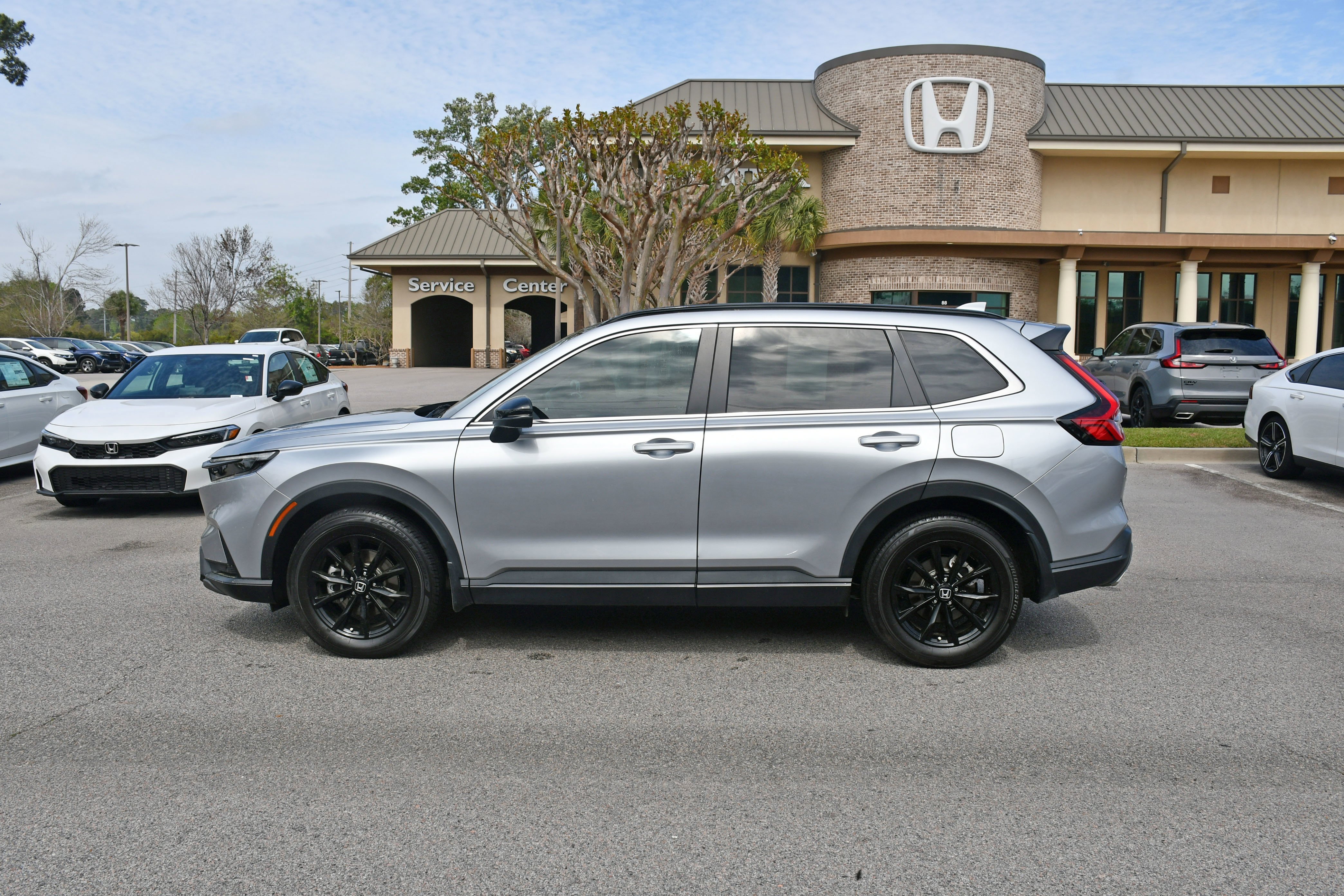 Used 2024 Silver Honda Sport-L image 1