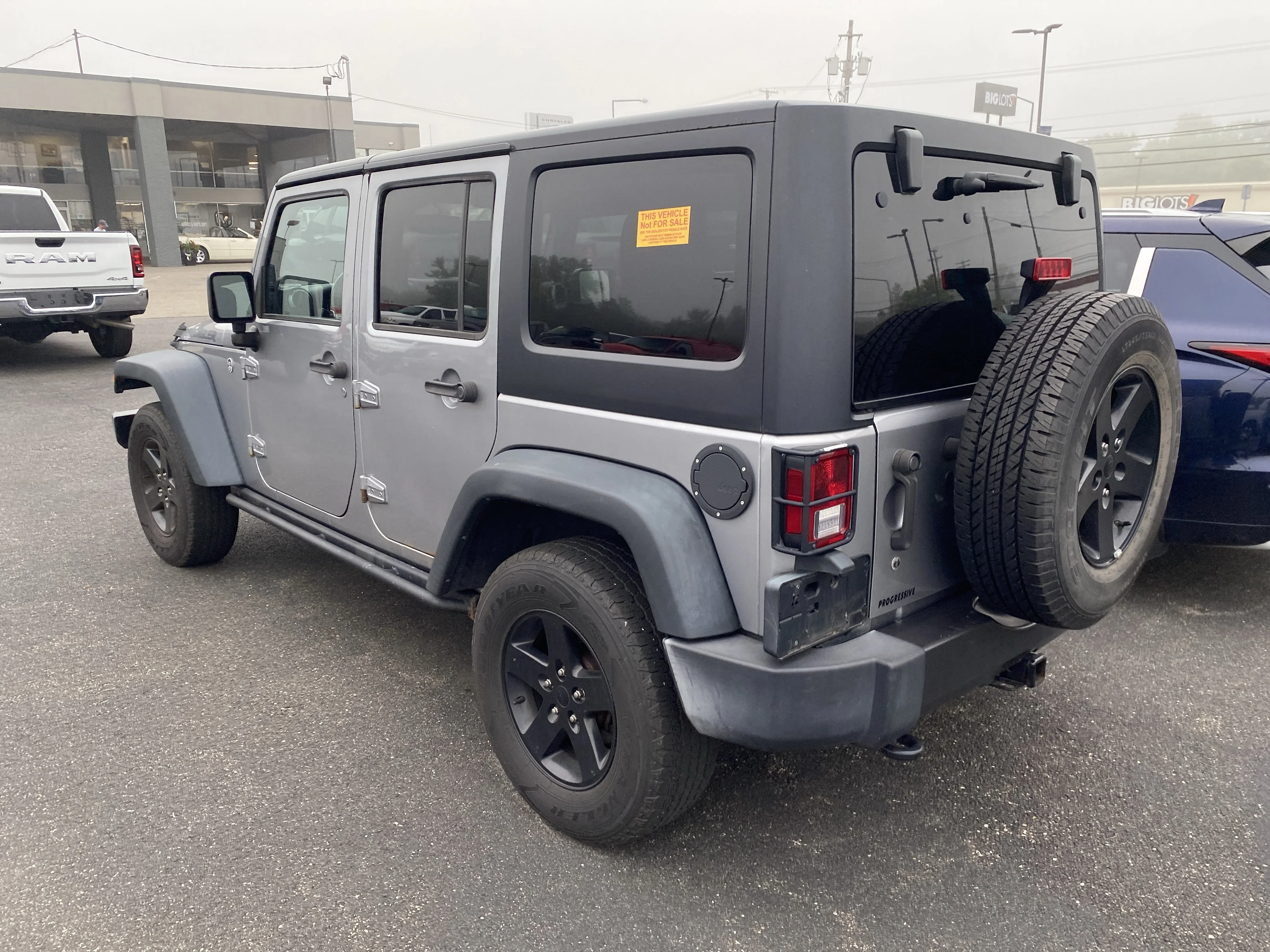 Used 2016 Billet Silver Metallic Clearcoat Jeep  image 4