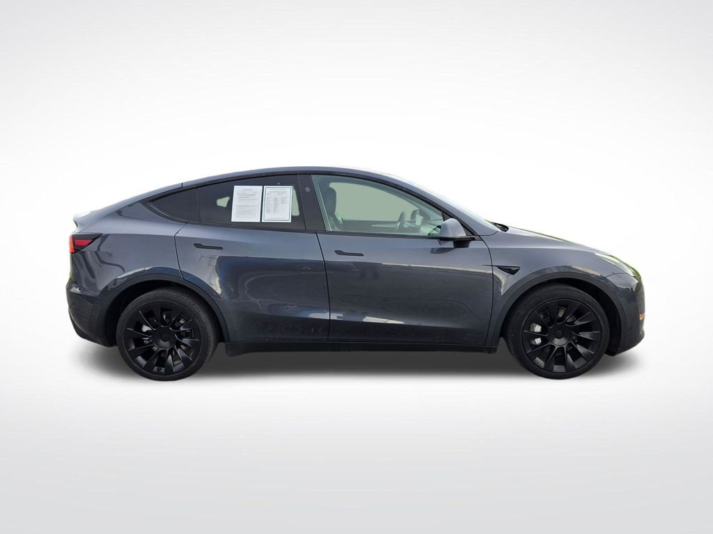 Used 2023 Tesla Model Y Long Range with VIN 7SAYGDEEXPA206027 for sale in Omaha, NE