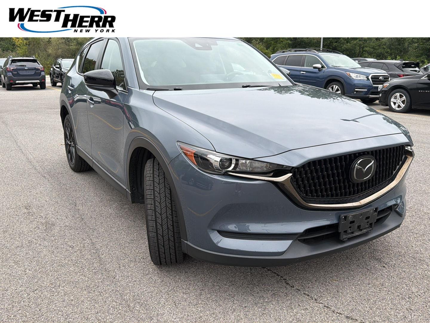 Used 2021 Polymetal Gray Mazda Carbon Edition image 1