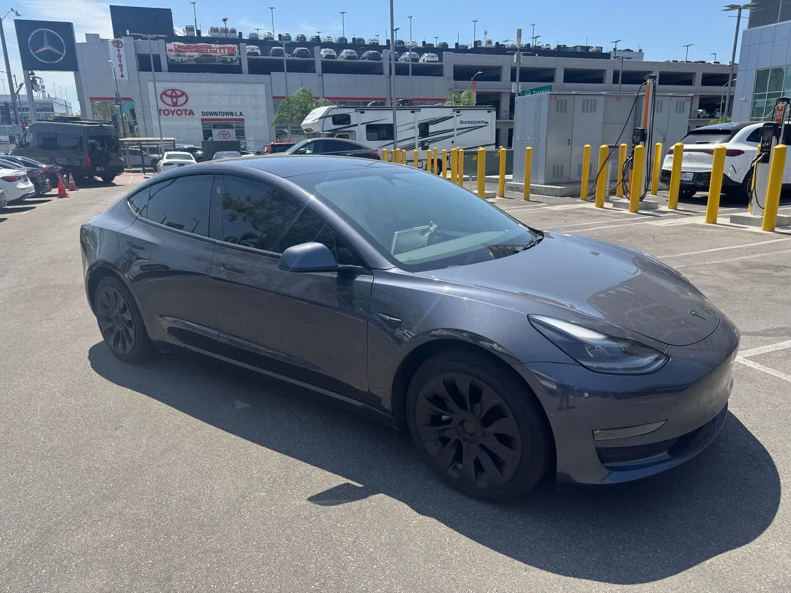 Used 2022 Solid Black Tesla Long Range image 3