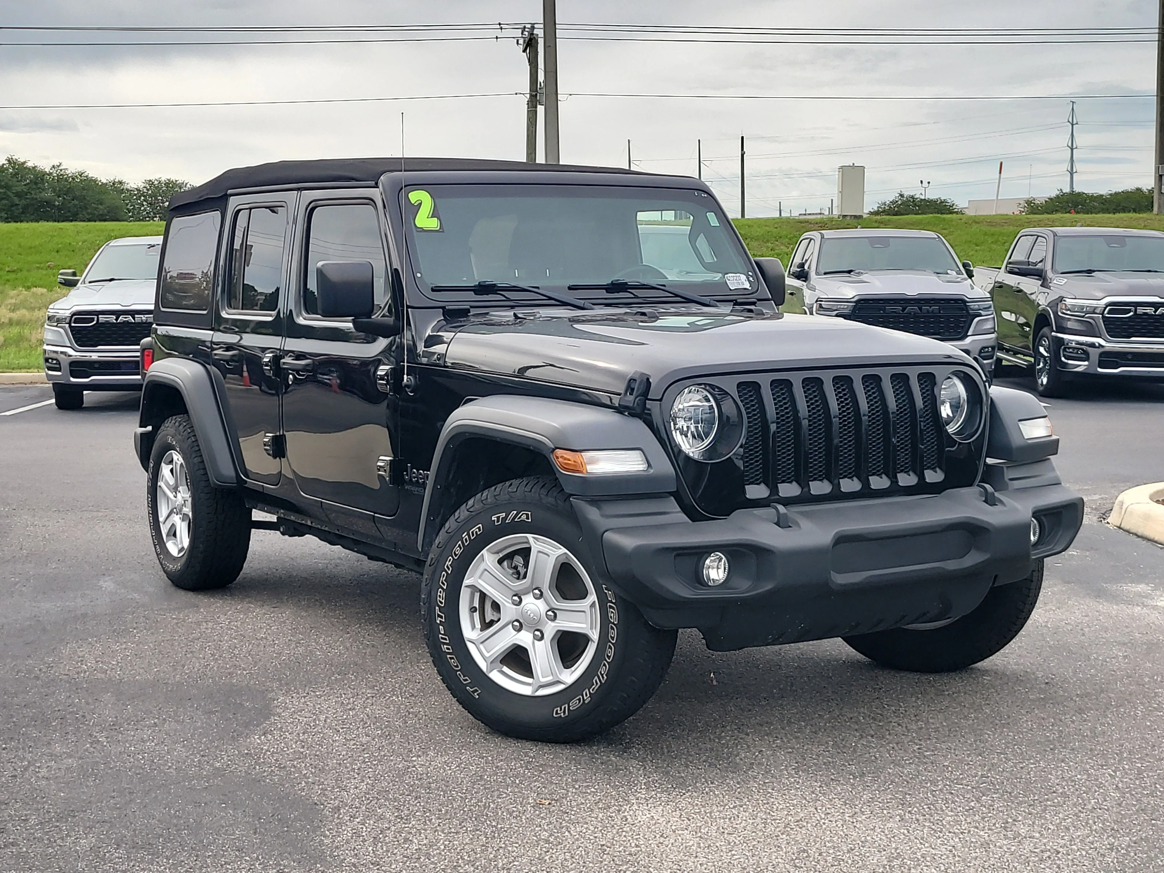 Used 2022 Black Clearcoat Jeep Unlimited Sport S image 1