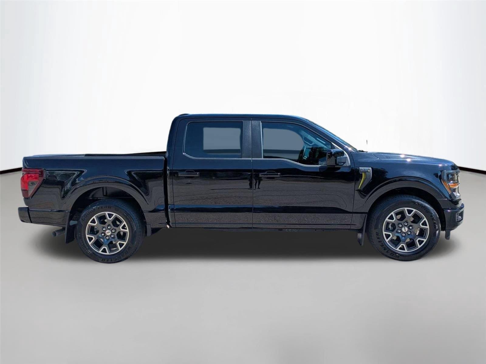 Used 2025 Agate Black Metallic Ford STX image 4