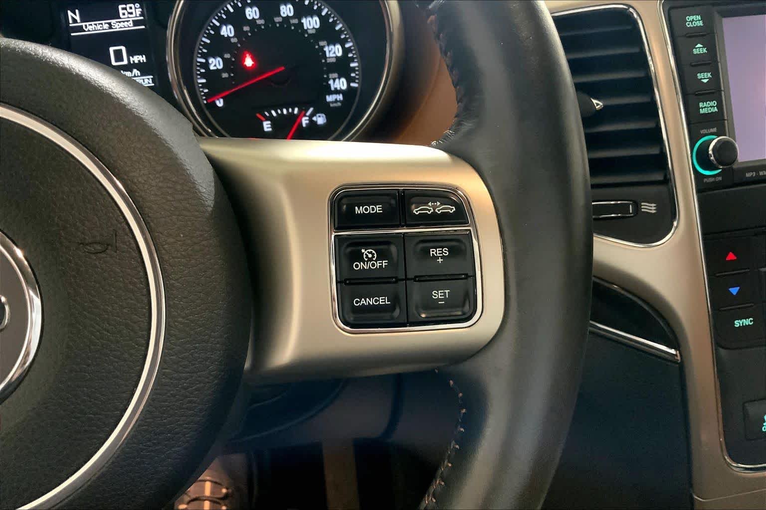 Used 2011 White Gold Jeep Overland Summit image 24