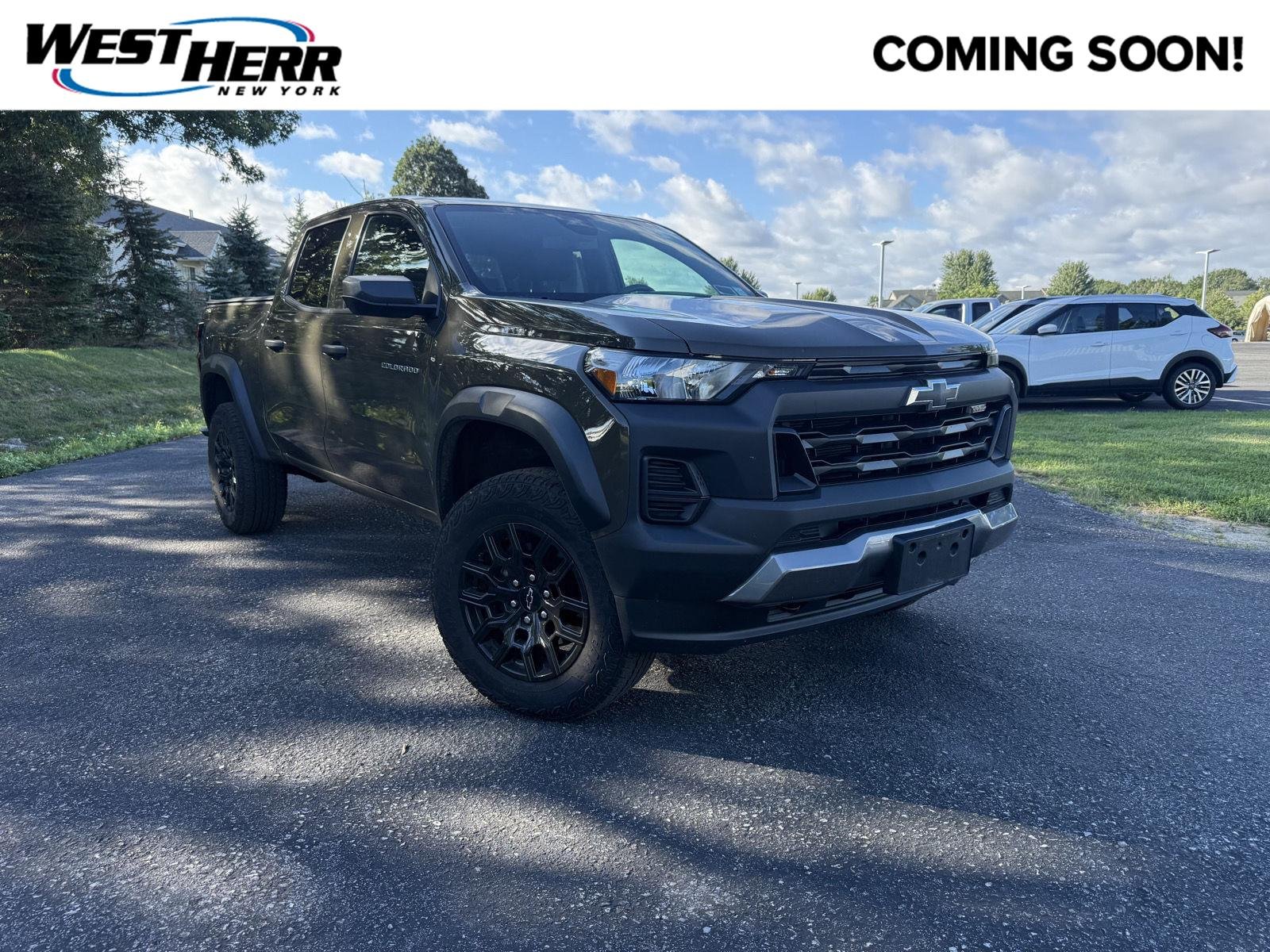 Used 2024 Harvest Bronze Metallic Chevrolet 4WD Trail Boss image 1