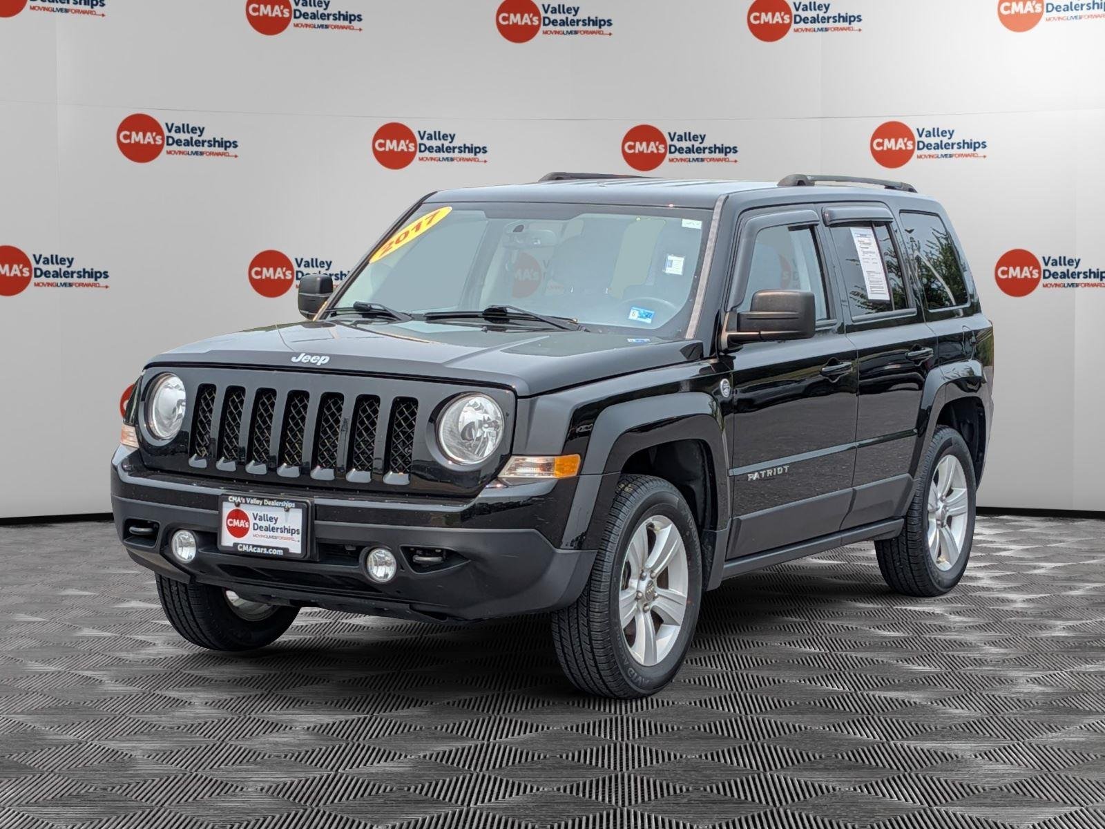 Used 2017 Black Clearcoat Jeep Latitude image 1