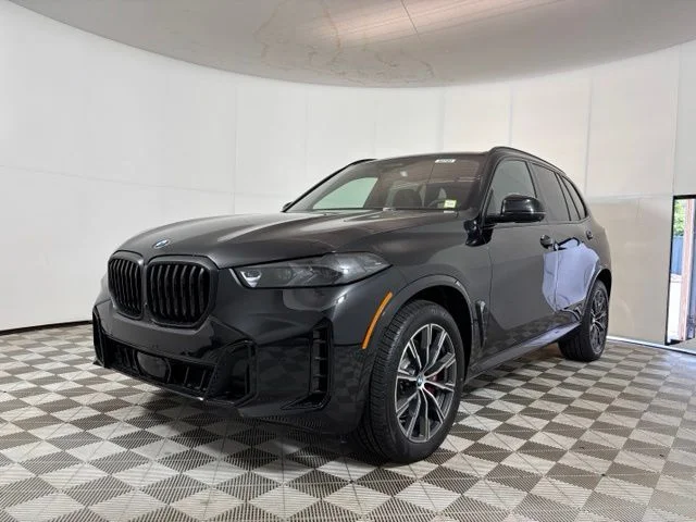 New 2026 Black Sapphire Metallic BMW xDrive40i image 3