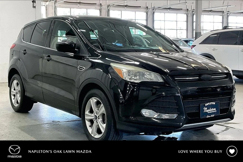 Used 2014 Black Ford SE image 1