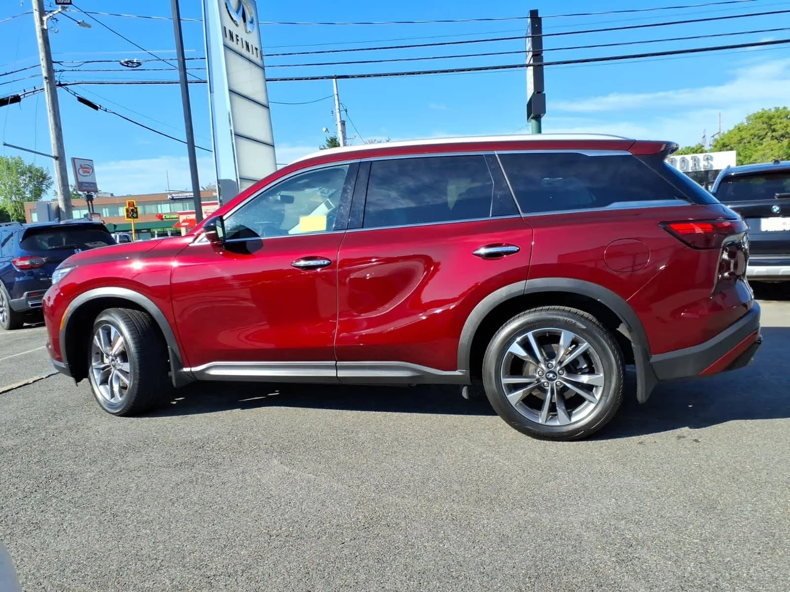 Certified Used 2023 Deep Bordeaux INFINITI LUXE image 7