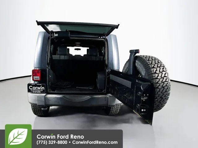 Used 2010 Black Clearcoat Jeep Unlimited Sport image 23
