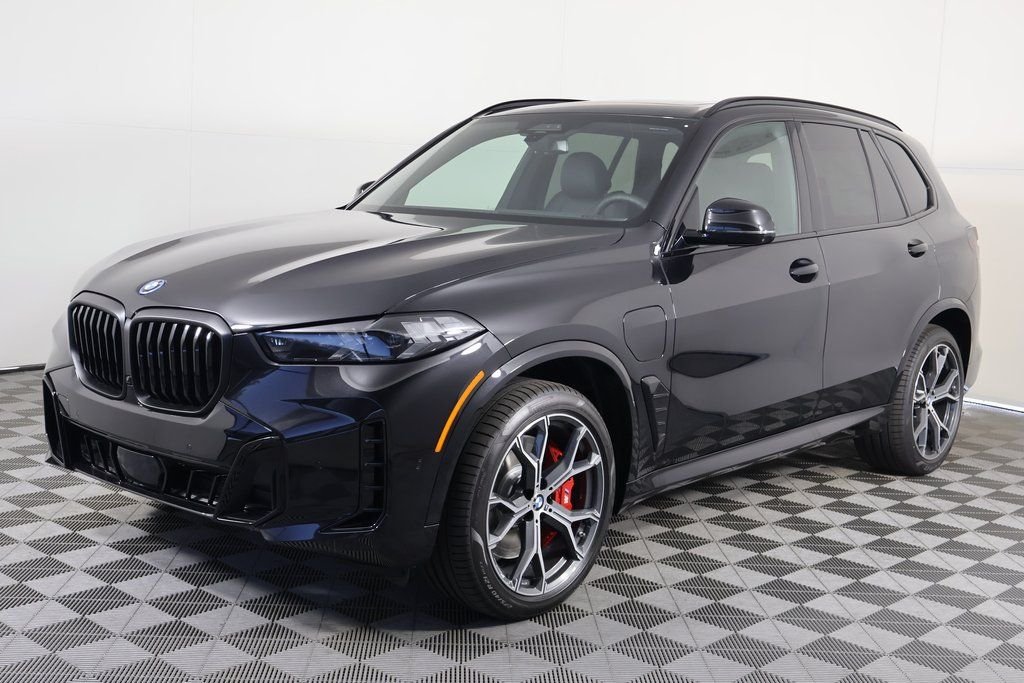 New 2026 Black Sapphire Metallic BMW xDrive50e image 1