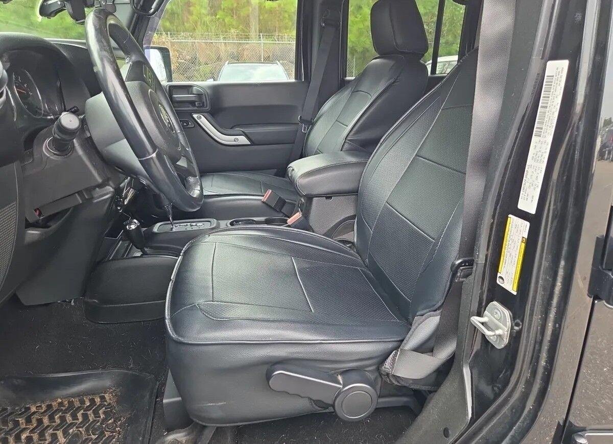 Used 2014 Black Clearcoat Jeep Sahara image 7
