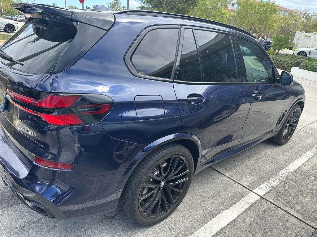 Certified Used 2024 Tanzanite Blue II Metallic BMW sDrive40i image 3