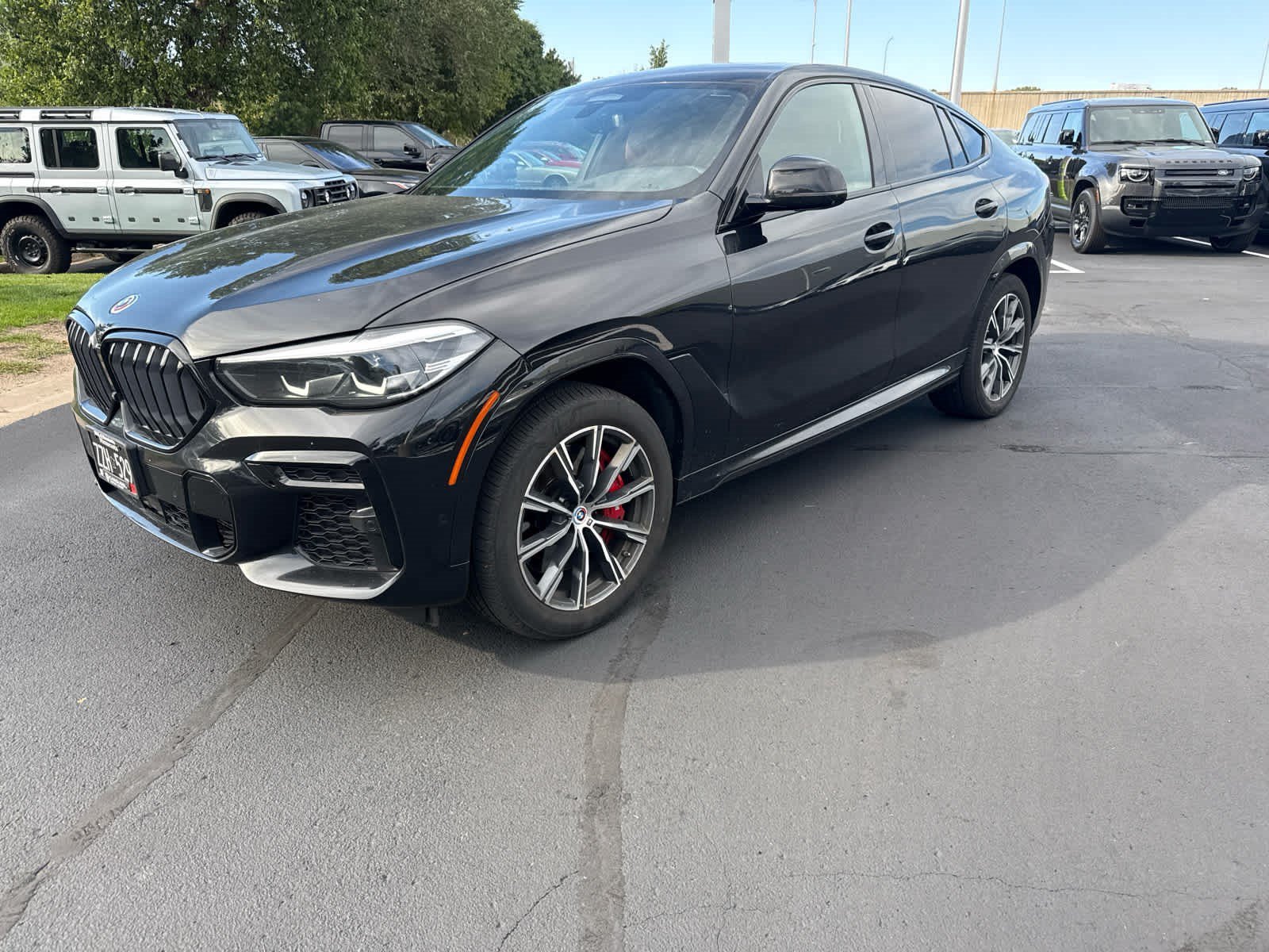 Used 2023 Black Sapphire Metallic BMW M50i image 1