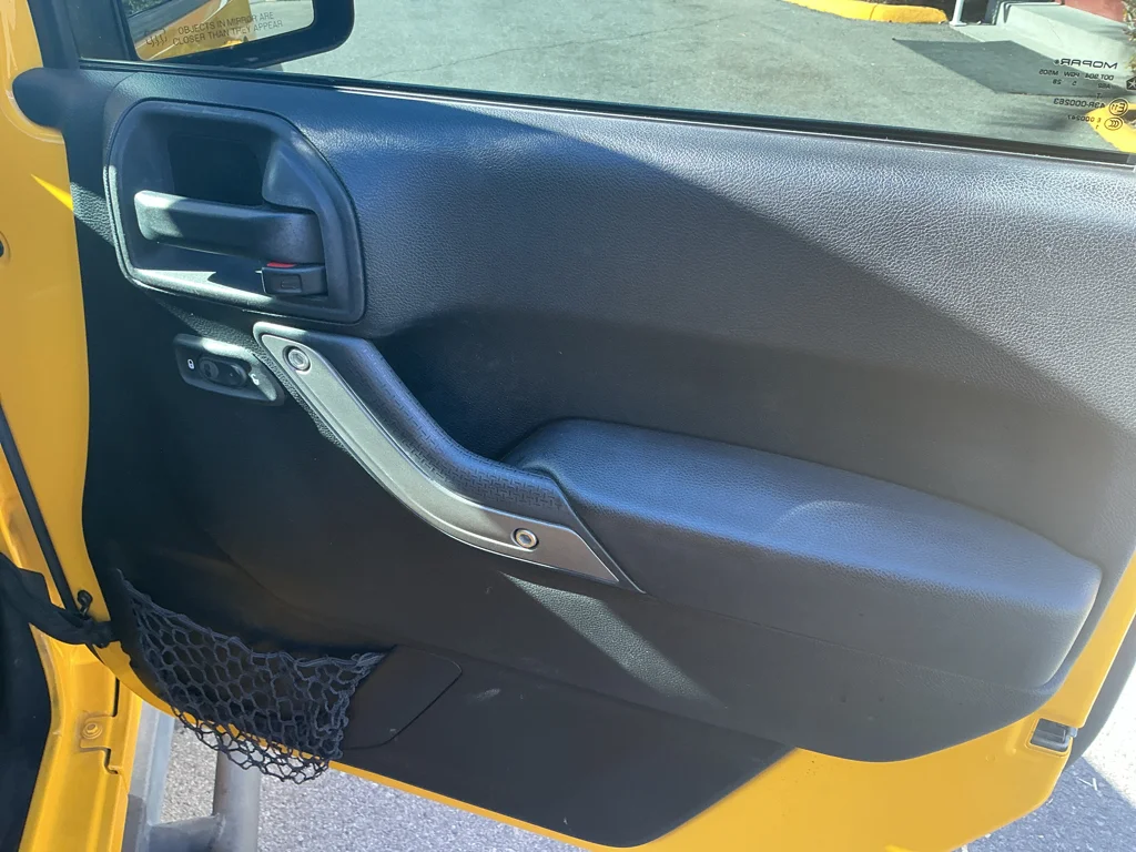 Used 2015 Baja Yellow Jeep Sport image 18