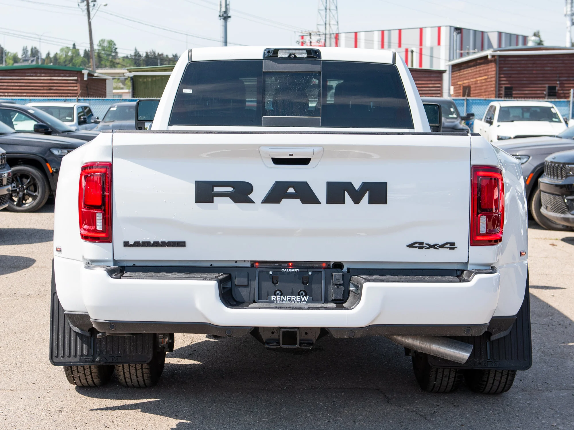 New 2026 White RAM Laramie* image 4