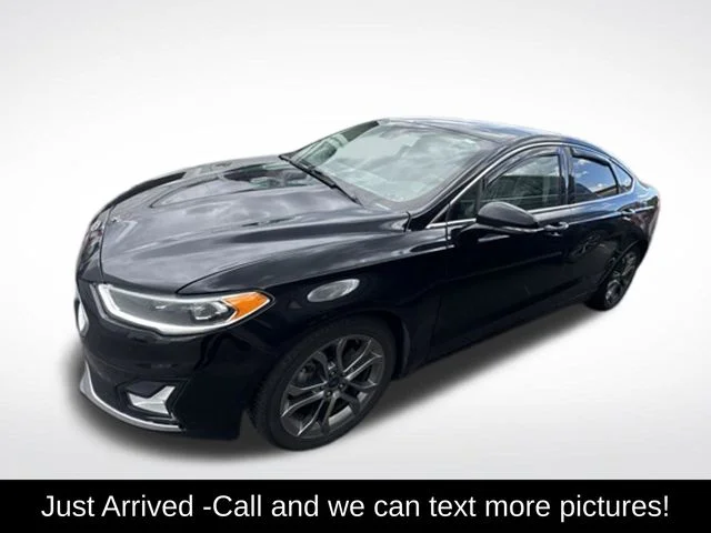 Used 2020 Black Ford Titanium image 1
