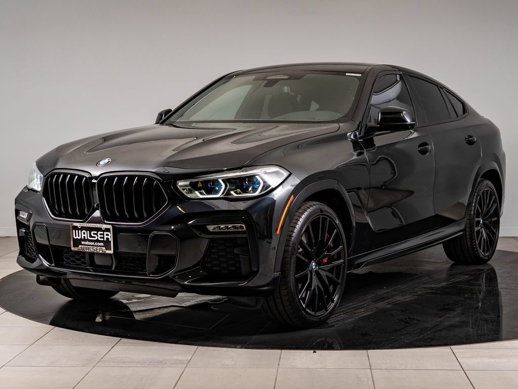 Used 2021 Black Sapphire Metallic BMW M50i image 1