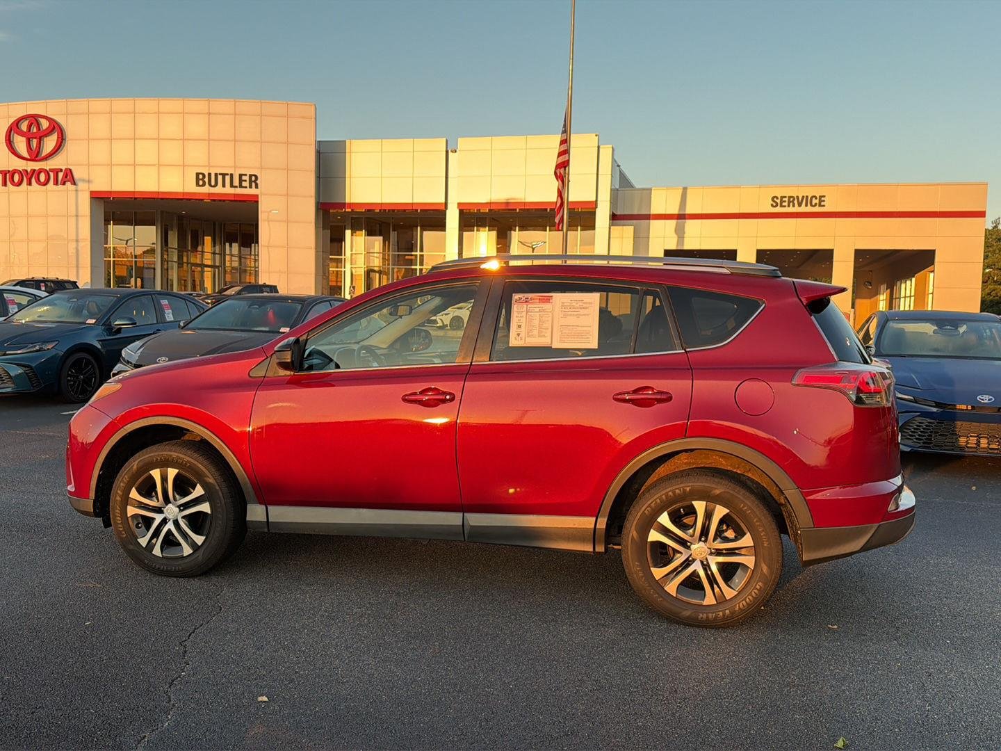 Used 2018 Ruby Flare Pearl Toyota LE image 3