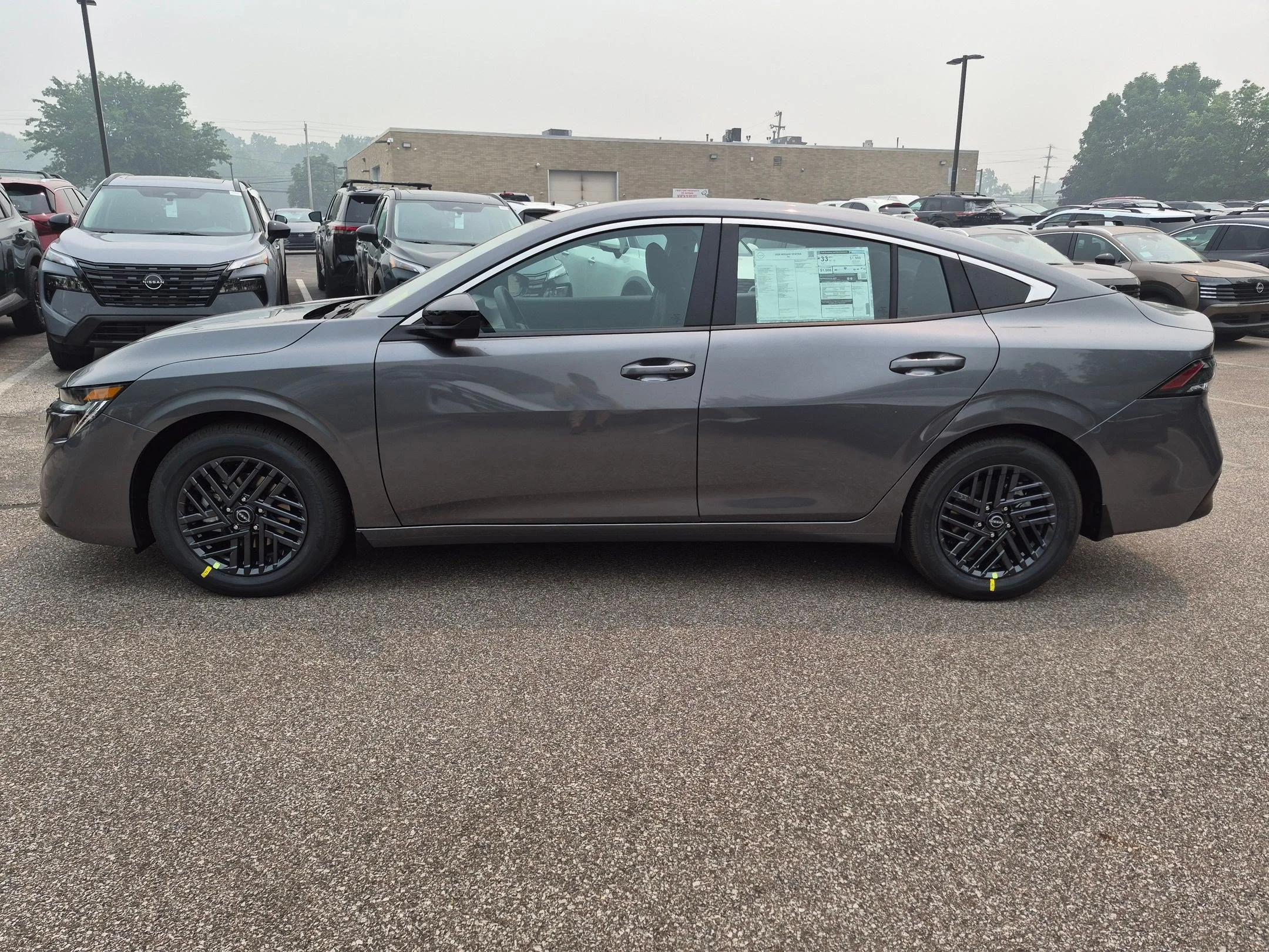 New 2026 Gun Metallic Nissan SV image 9