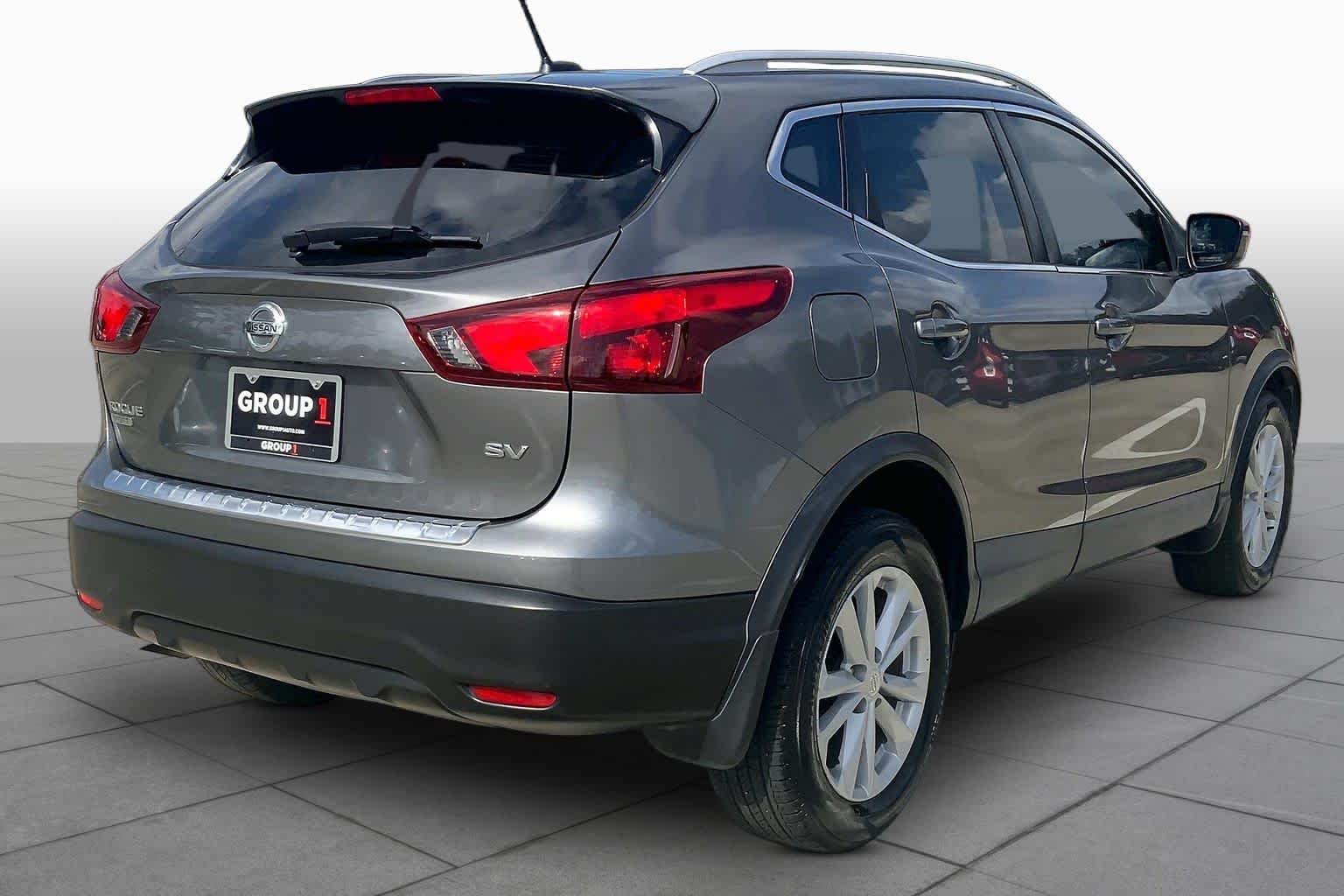 Used 2017 Gun Metallic Nissan SV image 13
