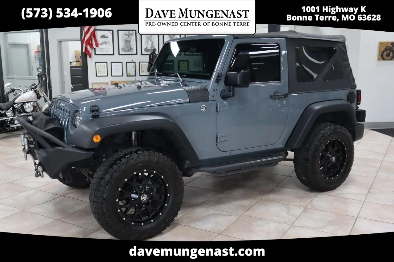 Used 2015 Hydro Blue Pearl Coat Jeep Sport image 1