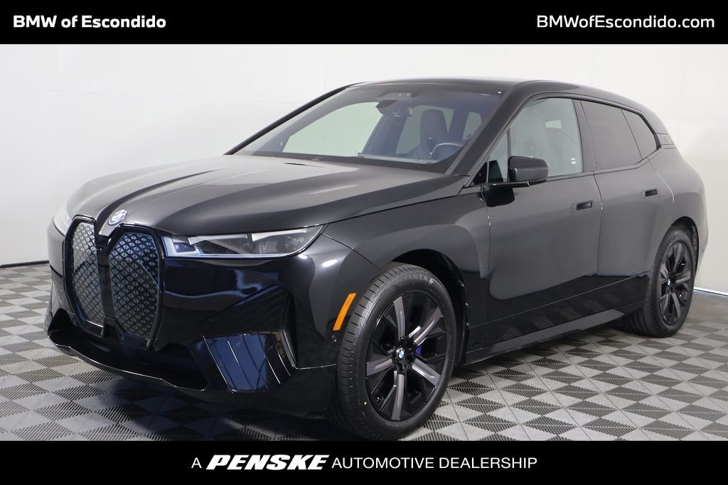 Certified Used 2024 Black Sapphire Metallic BMW xDrive50 image 1